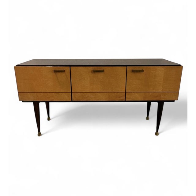 A striking example of Italian Mid-Century craftsmanship, this 1956 bedroom suite is finely executed in mahogany with...