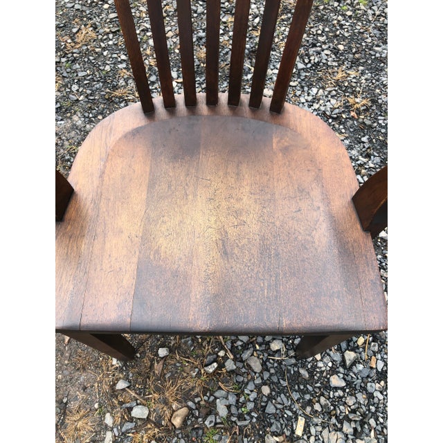 Great looking solid wood vintage bank desk chair having slatted back and contoured seat. arm height 26.75
