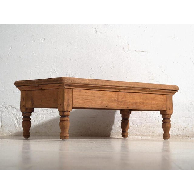 Antique low table in pine wood, traditional chinese furniture originating from northern china and dated circa 1930....