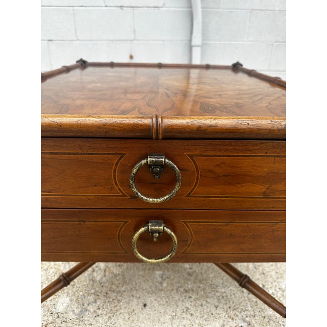 Super clean MCM Henredon Grand Tour faux bamboo and Burl wood end table with two drawers. Measures 24” x 28” x 19.5 Circa...