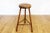 Superb bar stool from the 60s in solid wood. Original line with compass tripod base and high seat, all in solid wood....