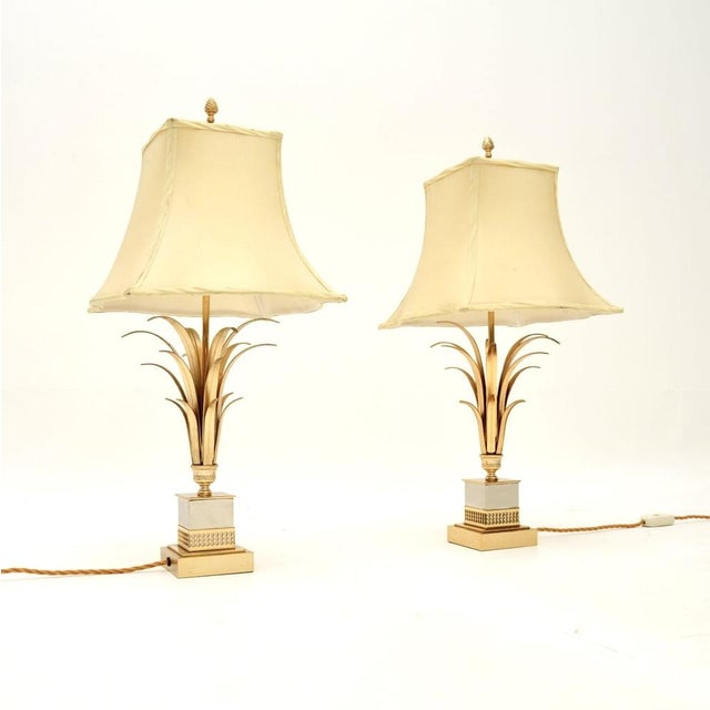 A beautiful pair of vintage table lamps by Boulanger, made in Belgium and dating from around the 1970’s. They are of...