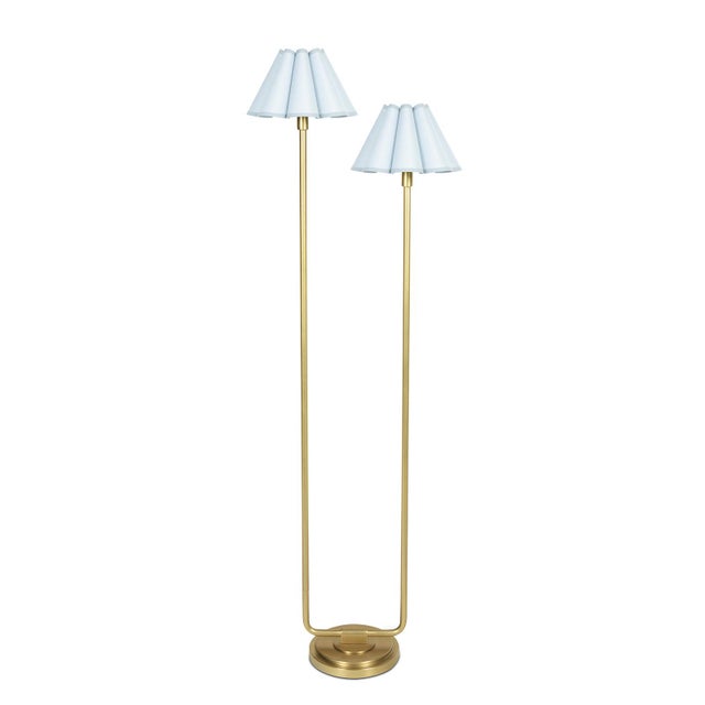 The Polly Floor Lamp exudes timeless elegance with its two scalloped shades, casting a soft, comforting glow that enhances...