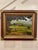 Painting by Ruth Apgar of a farm with a red barn, in a pretty gold corner frame with gold mat.