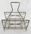 Vintage stainless steel magazine rack with modern design. Circa:1960's-1970's.