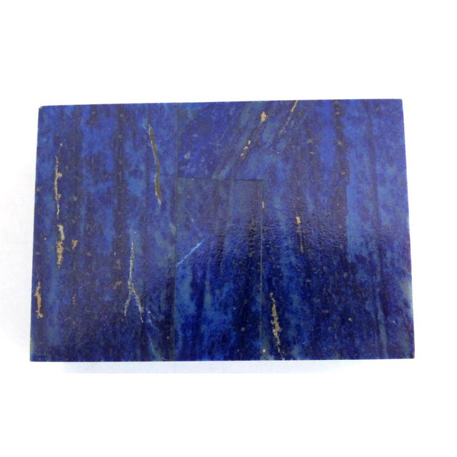 This exquisite handcrafted trinket jewelry box features a deep celestial blue Lapis Lazuli mosaic exterior seamlessly fit...