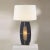 Mid-Century Modern Delacey Table Lamp With Nightlight - Ebony Wood Finish, Weathered Brass, White Linen Shade For Sale - Image 3 of 11