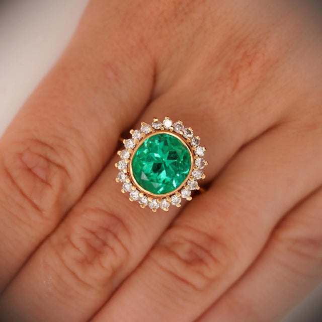 GIA Certified 4.30 Carat Oval Cut Minor Oil Natural Colombian Emerald and Round Cut Diamond Halo Bezel Set Sunburst Button...