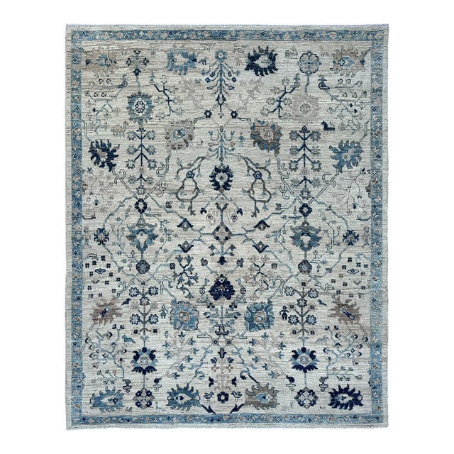 Oushak Handmade Wool Rug With Blue and Ivory Floral Design For Sale