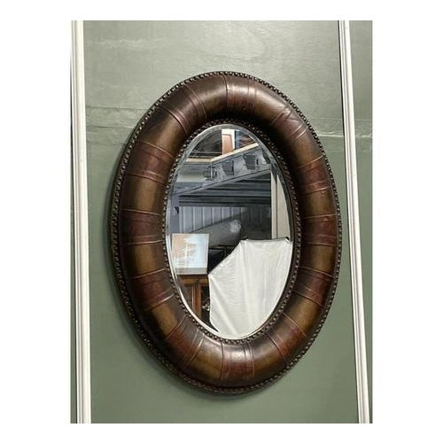 a lovely brown leather cushion studded leather wall mirror. We have lightly restored this by giving it a hand clean, hand...