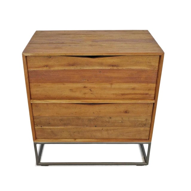 Solid sturdy teak wood nightstand with iron legs and two spacious drawers. Modern design and beautiful natural wood grain,...