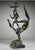 Chaim Gross (American, 1904-1991) Patinated cast bronze sculpture, Three Acrobats, signed mounted on black marble plinth...