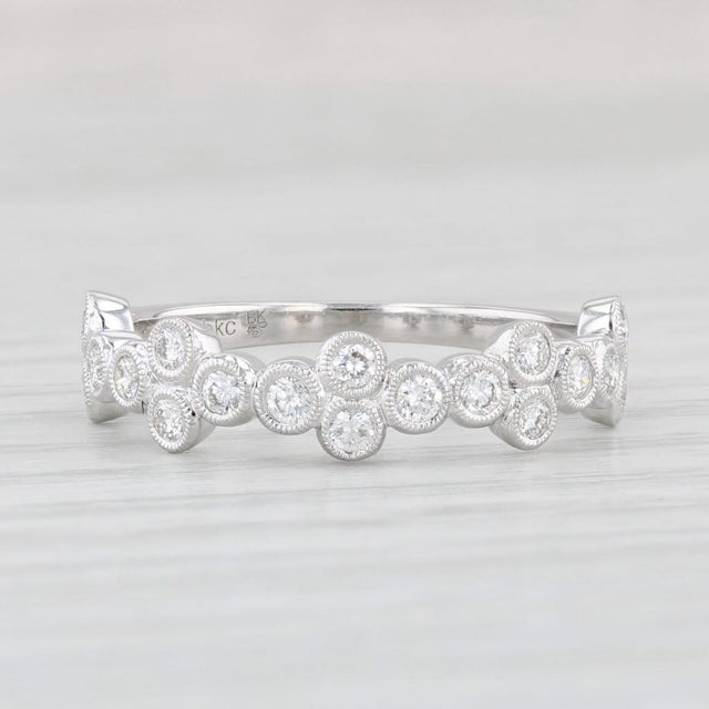 Gemstone Information: - Natural Diamonds - Total Carats - 0.47ctw Cut - Round Brilliant Color - H - I Clarity - VS2 - SI1...