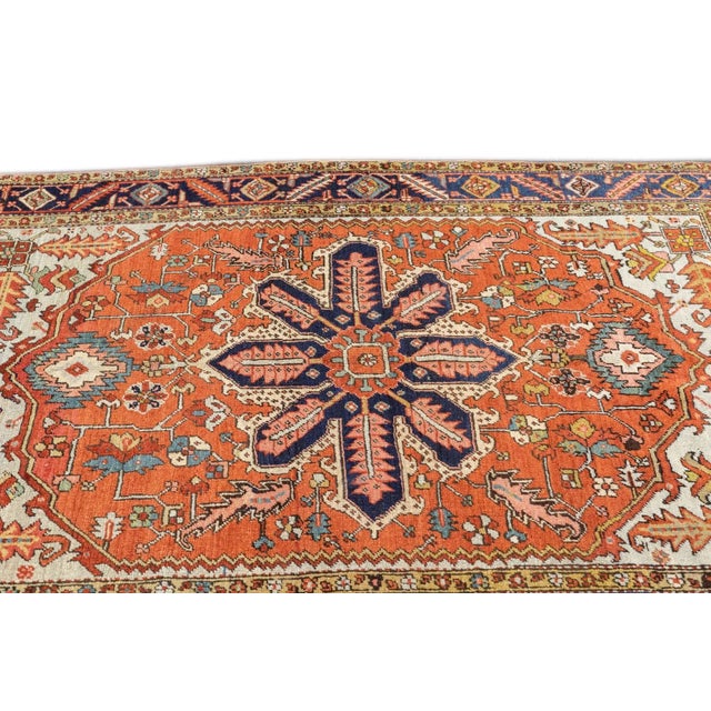 A higher grade of Heriz carpets, usually in medallion designs, with crisp natural dyes, and primarily woven between 1900...