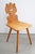 Folk Art Neo-Baroque Plank Chair Alpine style with vegetal ornamentation, Italy, 1950 Carvings with tendrils and leaves...