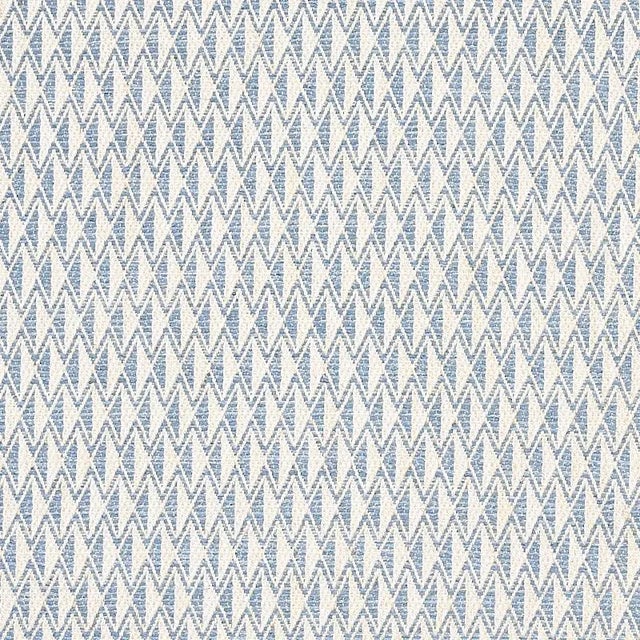 A chic take on the classic diamond motif; the luxe hand of this fabric belies its durability. Minimum order of 2 yards....