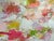 A cheerful burst of spring colors make this abstract oil painting a breath of fresh air.