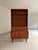 This 2-meter-high teak bookcase is a classic example of Danish furniture craftsmanship from the 1950s. with its...