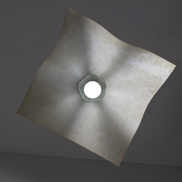 Pendant lamp from the "Area" series by Mario Bellini for Artemide. The series is characterized by a synthetic lampshade....