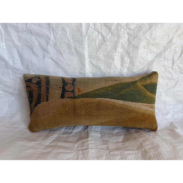 This distinctive 17th-century Brussels tapestry pillow is fashioned from an antique Flemish woven textile, reflecting the...