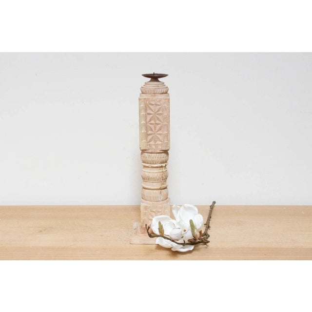 Handcrafted from reclaimed wood, this Indian candle holder reimagines the traditional charpai bed leg into a charming...