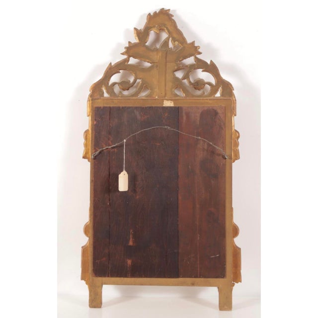 Vintage Italian Made Louis XVI Style Carved Giltwood Mirror With Elaborate Floral Crest For Sale - Image 4 of 7