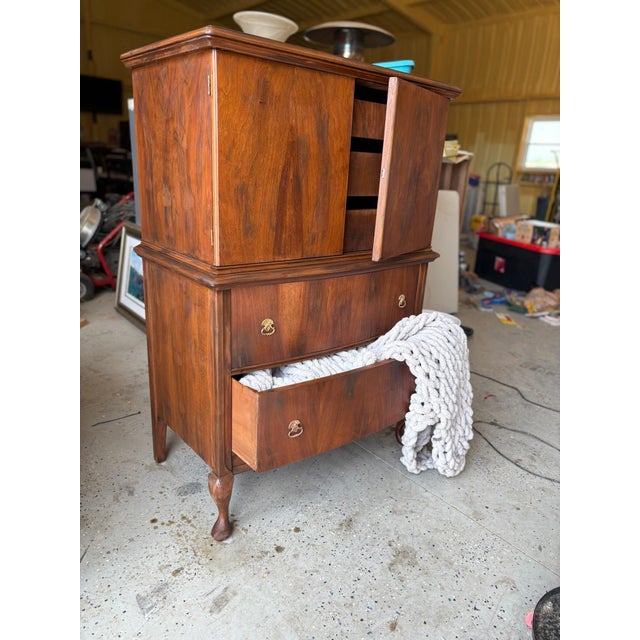 MCM linen closet! Minor damage in a couple spots where the veneer has come off and was patched/stained over. Original...