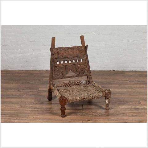 Rustic Indian Low Wooden Chair with Rope Seat and Weathered Appearance For Sale - Image 10 of 12
