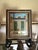Charming signed miniature painting depicting a classic New Orleans shotgun house with iconic green shutters, decorative...