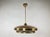 The ceiling lamp was manufactured by L'udib from Bratislava in the 1950s. The upper part and lower rim of the saucer are...