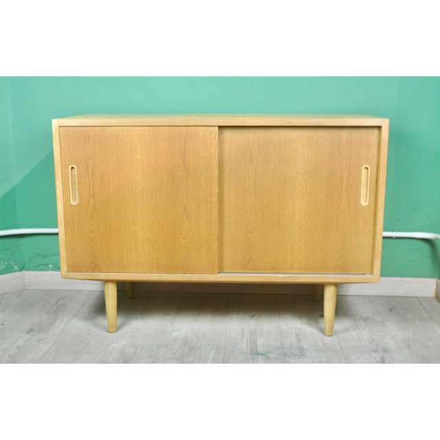 Danish Sideboard in Beech by Brand Hundevad for Hundevad & Co., 1970s, in Good conditions. Designed 1970 to 1979 This...