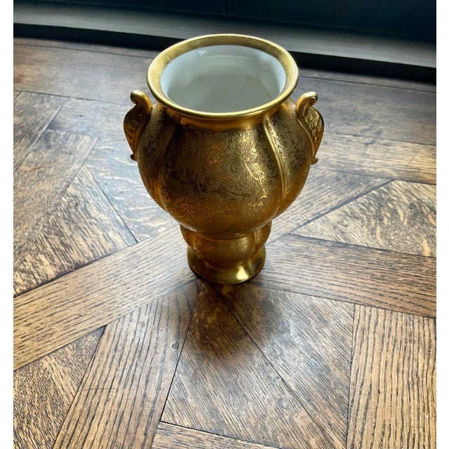 Beautiful gold texture embossed vase shows flowers beautifully.