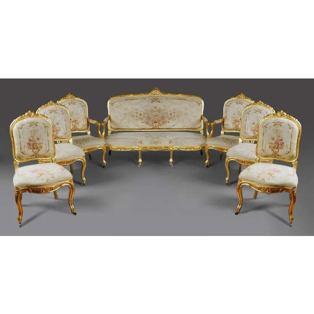 Fine French Aubusson tapestry Napoleon III period Louis XV style 7-piece parlor set. This beautiful carved giltwood set is...