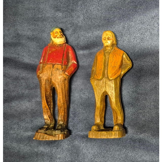 These are vintage Syroco wood figurines from the mid-century era, likely dating to the 1940s. They are classic examples of...