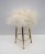 Small brass stool designed by Gio Ponti in the 1950s. Polished and covered with goat skin. This piece is attributed to the...