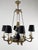 Striking Italian Empire-style chandelier executed in black lacquered metal with gilt bronze and brass details, dating from...