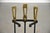 A mid century modern set of three fireplace tools in the style of Donald Deskey which share the same design as some of his...