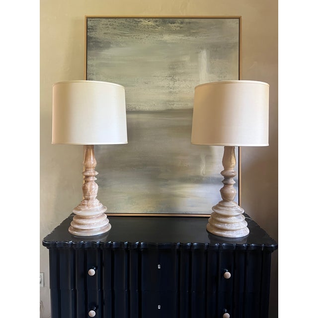 Solid alabaster lamp made by Ironies. The lamps are solid alabaster stone and weigh 39 pounds each. Each shade is 15...