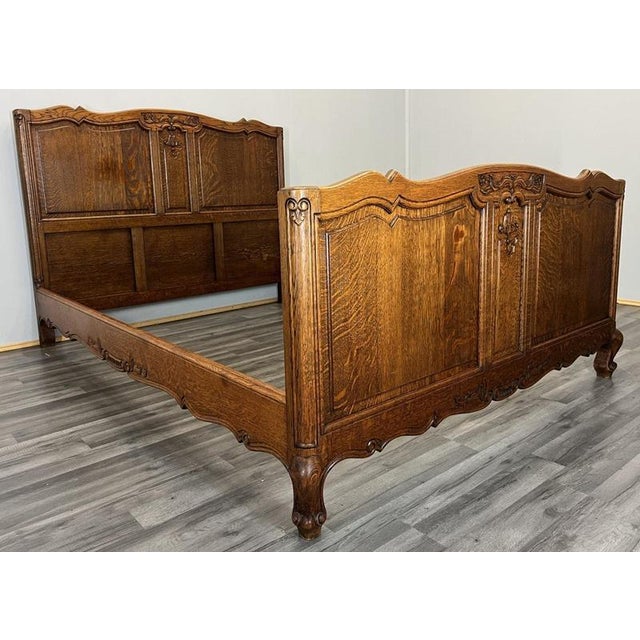 This beautiful Vintage French Louis double bed frame showcases richly carved detailing, elegant flowing lines and a deep...