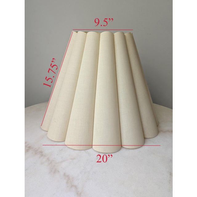 Oversized vintage lampshade with fluted design.