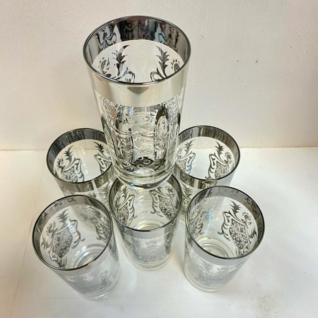 Beautiful set of Kimico Knight Tumblers with shiny silver trim. This set looks like it was barely used. Celebrate the King...