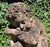 Cast stone garden figure of a sleeping boy on a ball, English, mid-20th century. Charming and unusual. Great patina. Well...