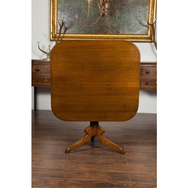 English 1870s Oak Tilt-Top Table with Turned Pedestal and Tripod Scrolling Feet For Sale In Atlanta - Image 6 of 9
