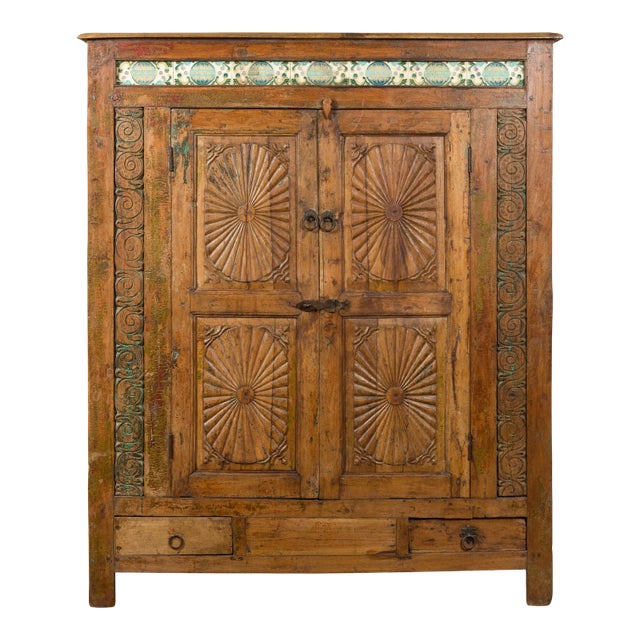 Indonesian 19th Century Cabinet with Sunburst Motifs and Enameled Tiles For Sale