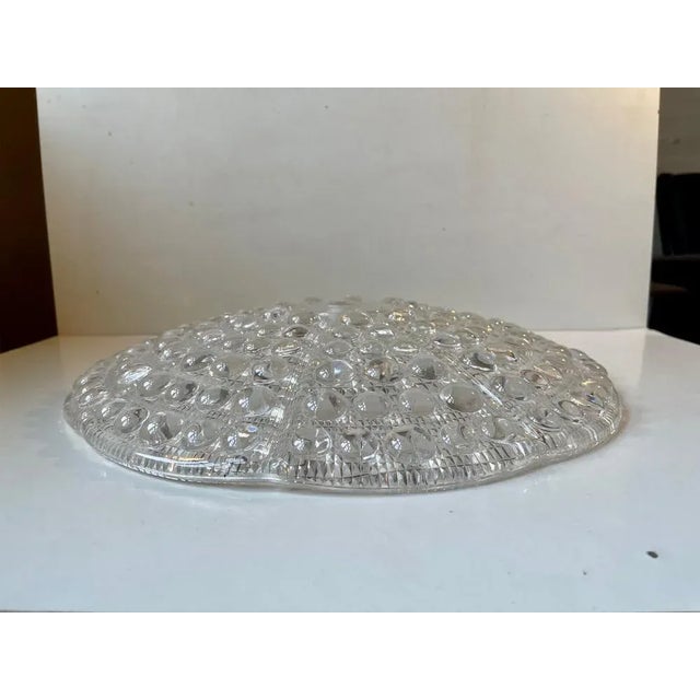 Heavy crystal shade designed by carl fagerlund and manufactured by orrefors in sweden during the early 1960s....