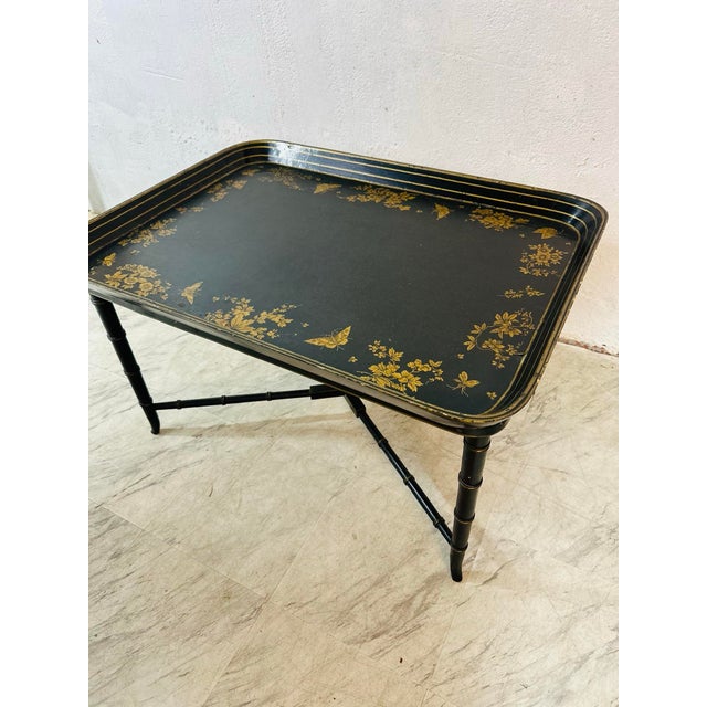Classic beauty, this tray table is a chinoiserie tray on a faux bamboo base. Its large size makes it especially unique as...