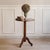 This dainty side table dates back to around 1900 and is a classic tripod salon table. The round top and elegantly curved...