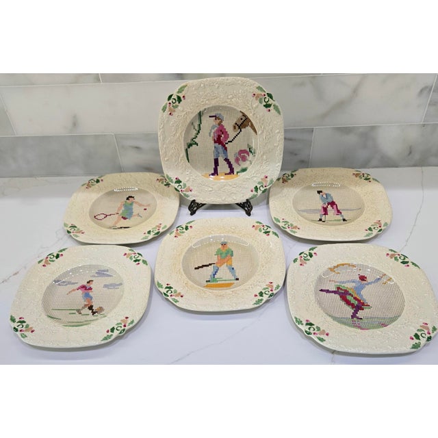A distinctive set of six English Mason’s Ironstone sporting plates, circa 1930, featuring colorful, needlepoint-style...