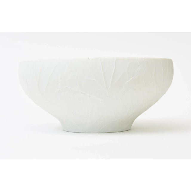 This hallmarked vintage 1950's white bisque porcelain bowl and serving bowl has an organic raised pattern. Says Heinrich H...