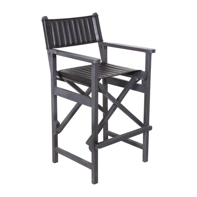 Elevate your bar or kitchen island with our Leather Black Barstool. Crafted with sleek black leather and a space-saving...